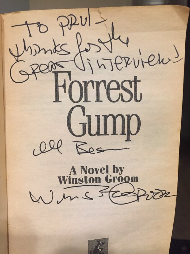 Inside of paperback edition of Forrest Gump with signature and personal message from author Winston Groom.